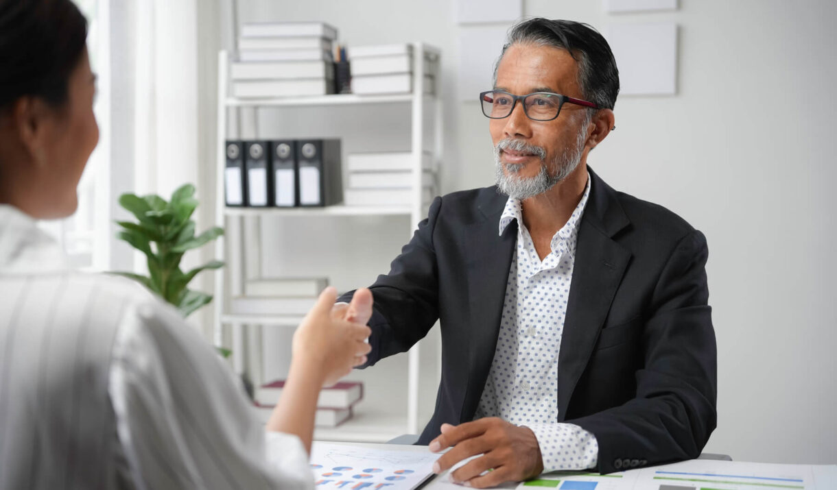 senior manager shaking hands with a young female p 2024 12 27 17 20 49 utc (1) (1)