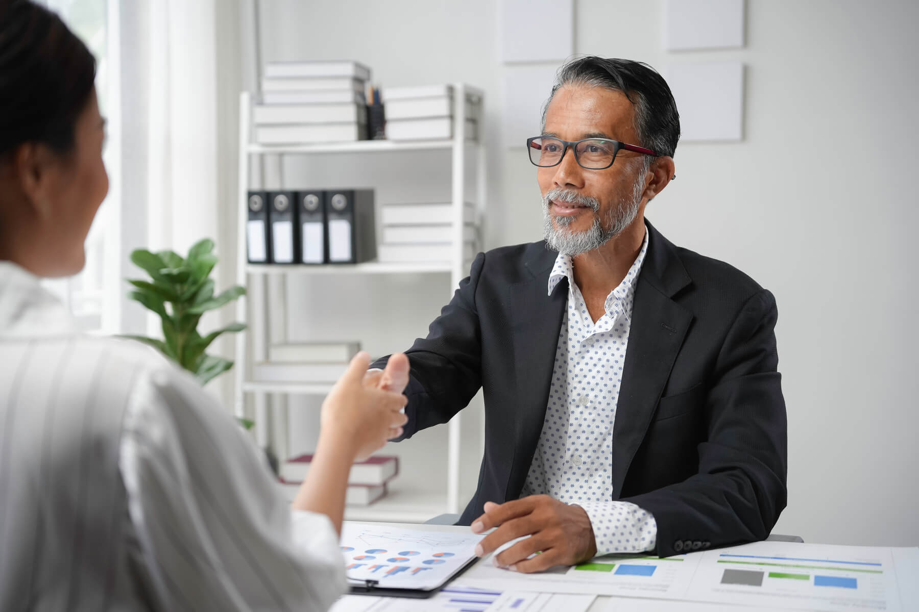 senior manager shaking hands with a young female p 2024 12 27 17 20 49 utc 1 1.jpg